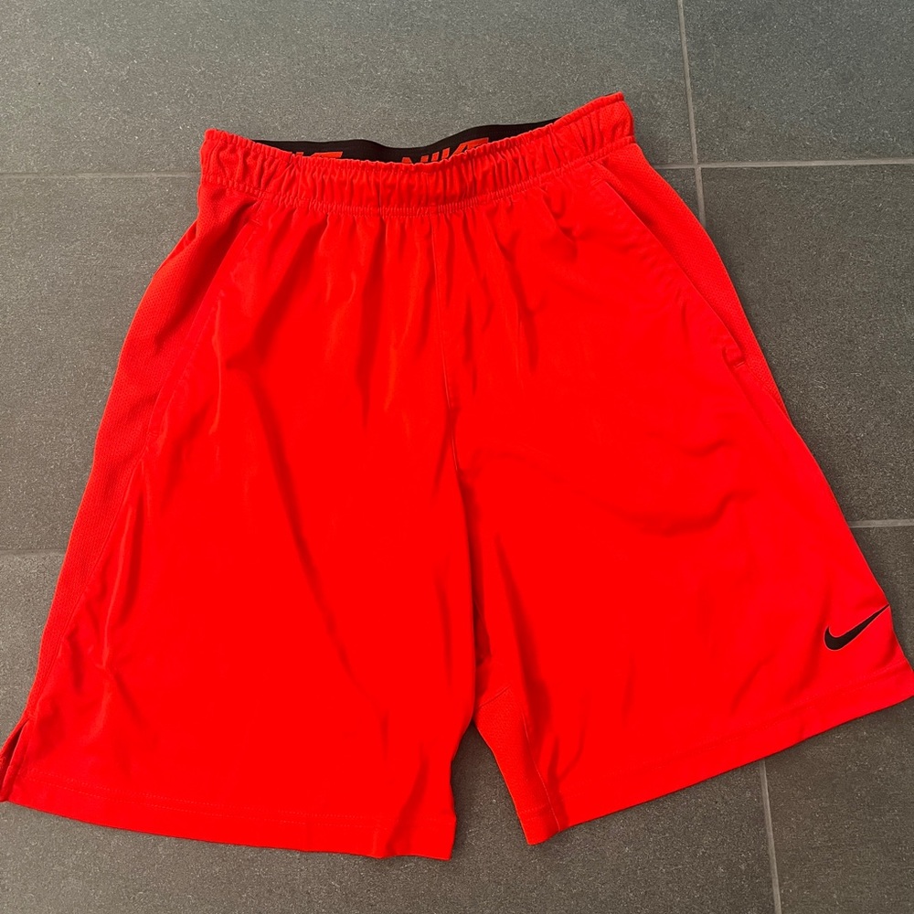 Men's red Nike Dri-Fit shorts, size medium